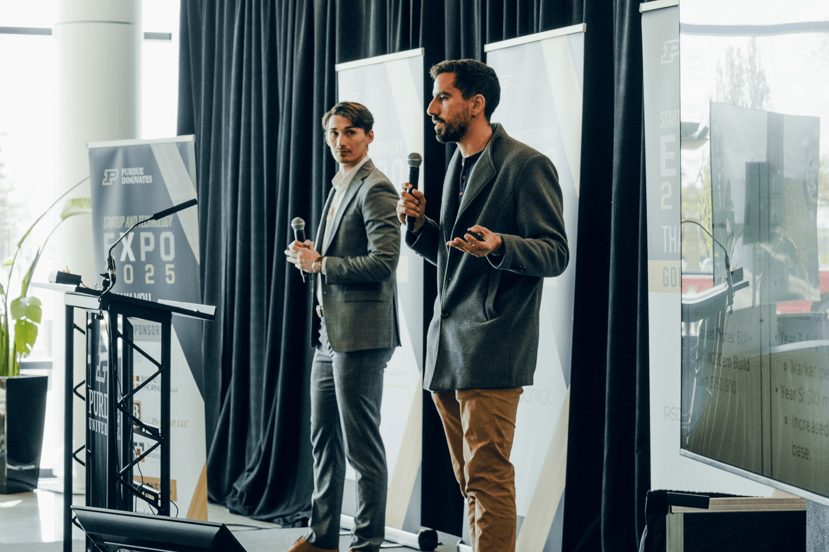 Translunar co‑founders pitching ACECam during the Startup & Technology Expo